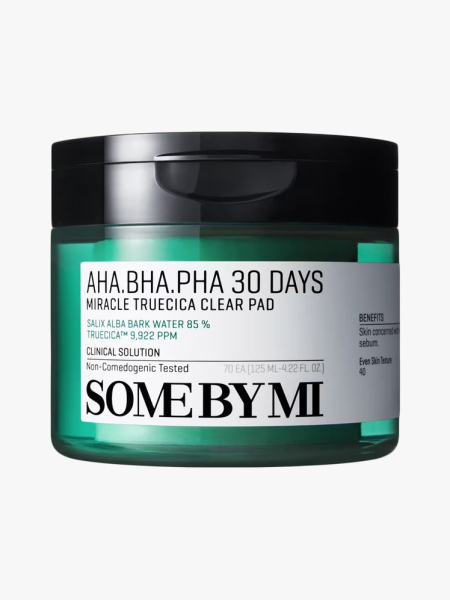 Some by Mi AHA BHA PHA 30 Days Miracle Truecica Clear Pad in branded tub component on a light gray background